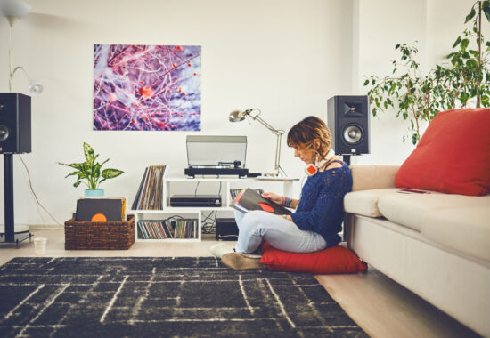 Woman listening vinyl at home Woman listening vinyl at home