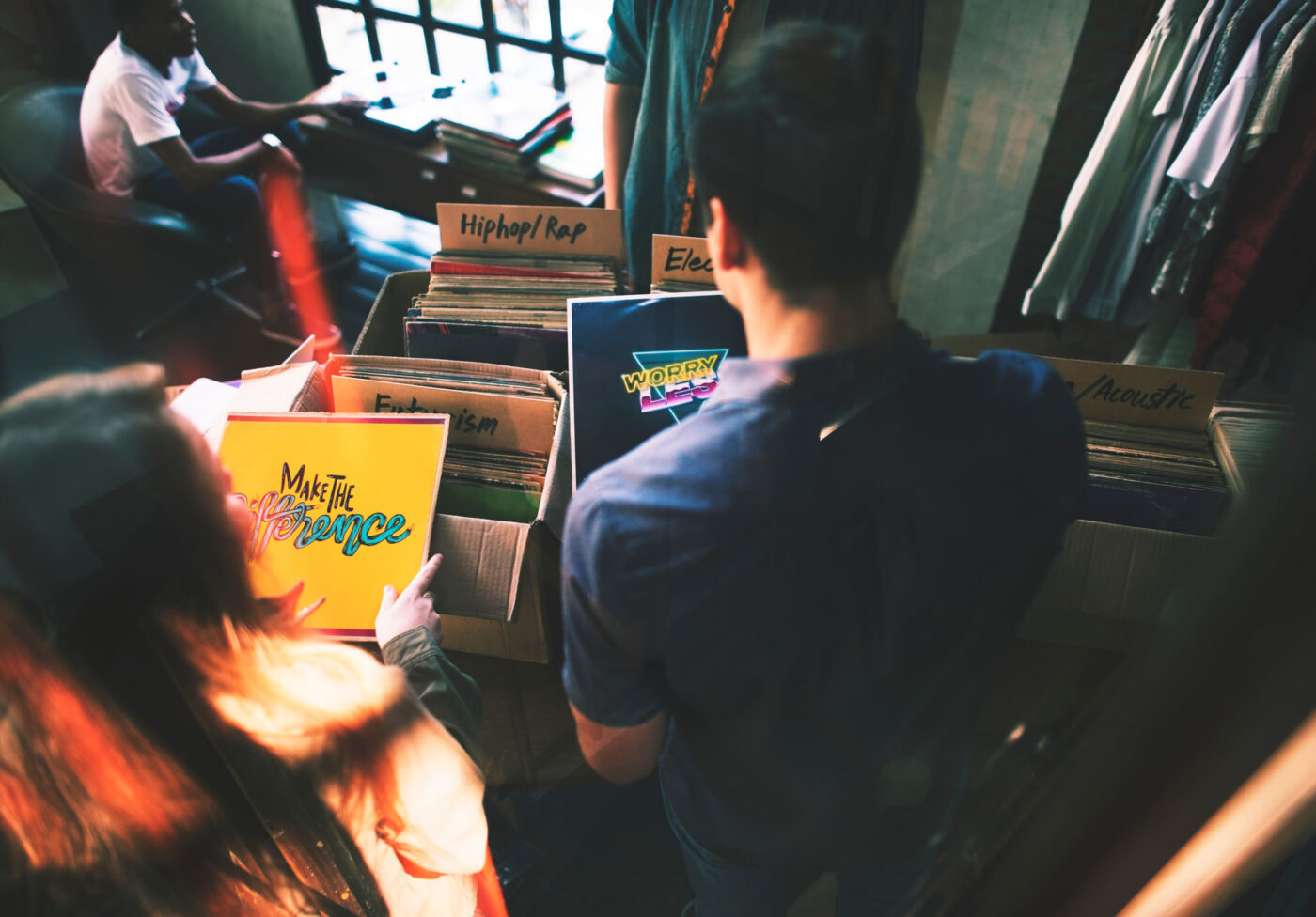 Young people in a record shop Young people in a record shop